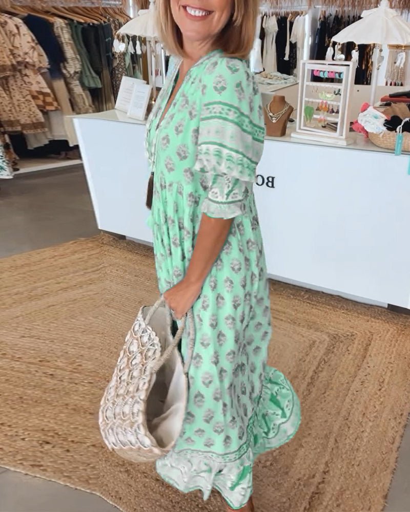 MANA | MIDIJURK MET FLORALE DESSINS EN V-HALS