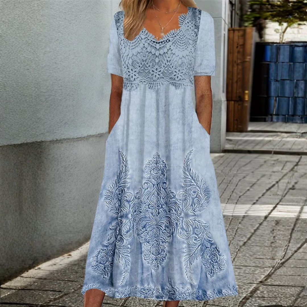 INDIGO | ELEGANTE MIDIJURK MET BLOEMENDESSIN